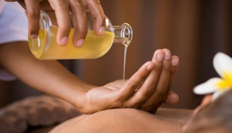 Spa aromatherapy session with essential oils for stress relief
